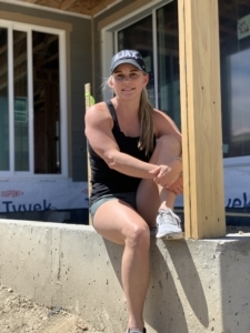 blonde sitting at new home construction in Denver