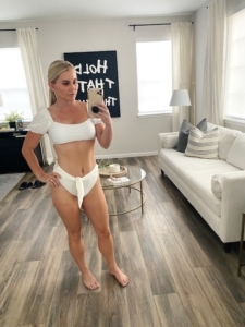 blonde girl wearing trendy white bikini