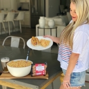 blonde girl with budweiser brats and macaroni salad