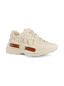 Retro Gucci shoe in off white with Gucci written on the side