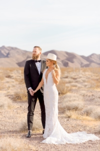 bride and groom in las vegas desert