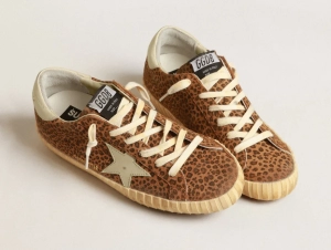 Animal print Golden Goose sneakers in tan with white star